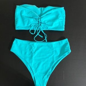 Tiffany color 2piece bikini the top you can put on either side removable pads.
